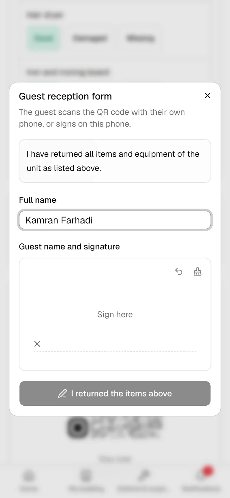 The guest confirms the name and signs inside the box with a finger.